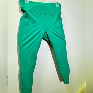 LULULEMON women's fast and free leggings size 10 green.